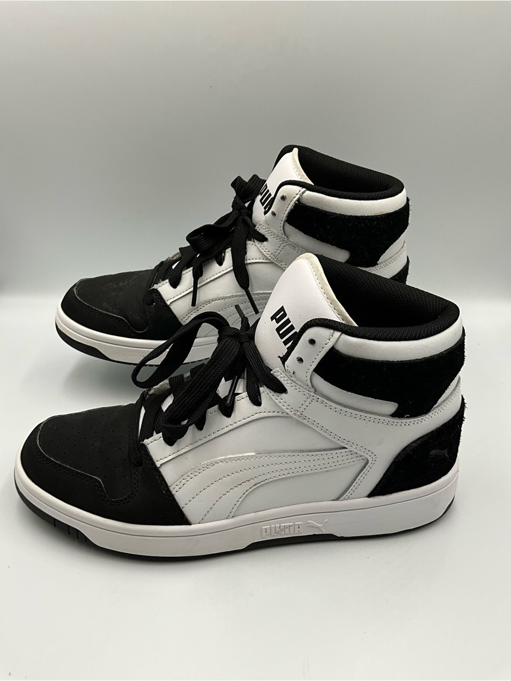 Puma Mid-Top Sneakers Size 9.5 Black and White Mid-Top Sneakers